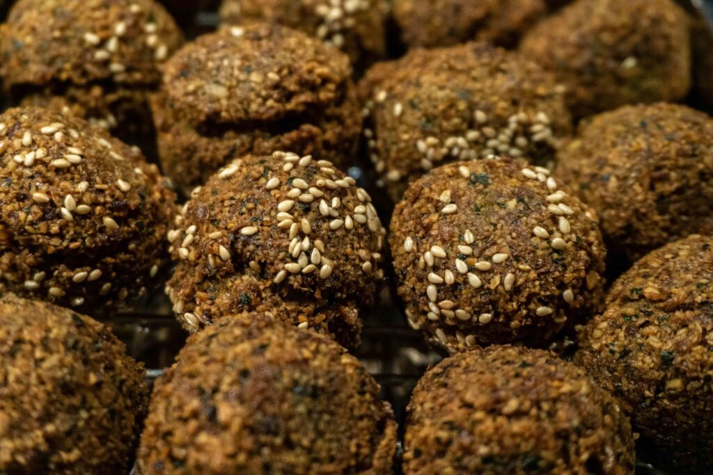 fried falafel being cooked in oil